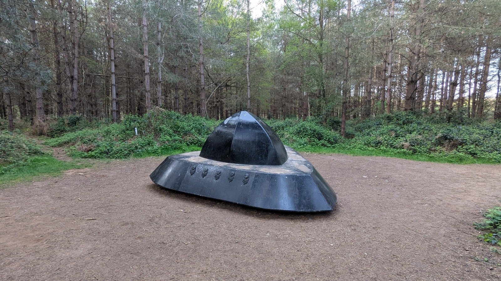 Modern UFO-themed sculpture/waymarker on the forest's public 'UFO Trail,' commemorating the incident.
